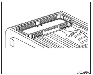 Nissan Frontier cargo carrier mounted in truck bed