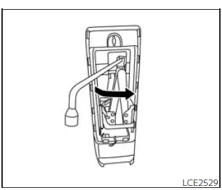 Nissan Frontier jack removal using wheel nut wrench