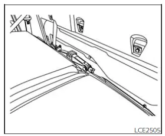 Nissan Frontier King Cab jack and tool storage arrangement