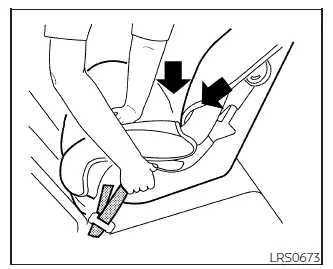 Nissan Frontier rear-facing child seat installation tightening procedure step 3
