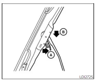 Nissan Frontier windshield wiper blade release tab and removal direction